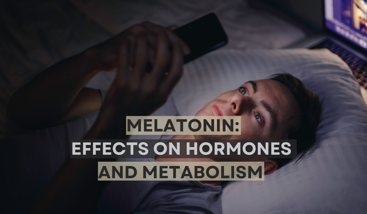 A man looking at his phone in bed. Light at night reduces natural levels of melatonin.